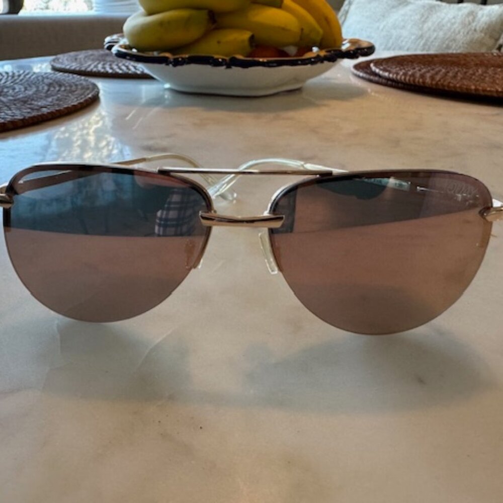 Quay Aviator Sunglasses.  Gold metal with a slight goldish mirrored lens.